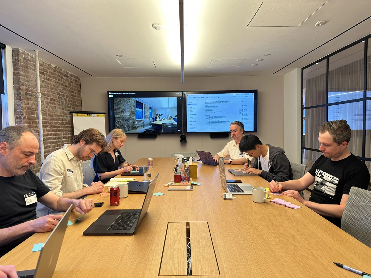 MCP maintainers collaborating during a writing session in New York City